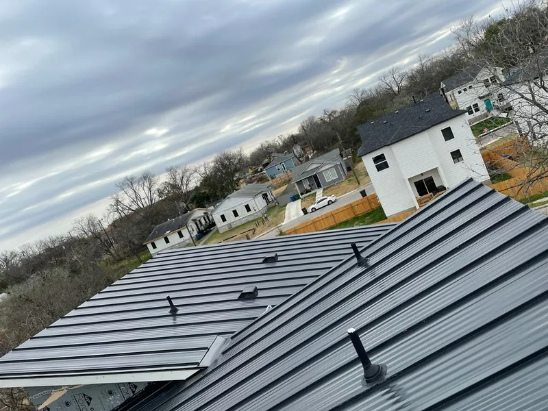 Standing seam metal roof panels with vents for Skylight Repair in Clear Lake
